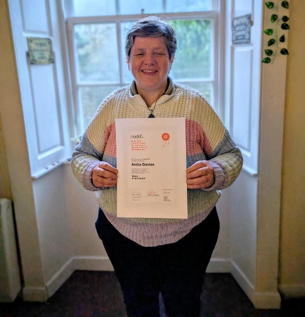 Anita Davies with her certificate